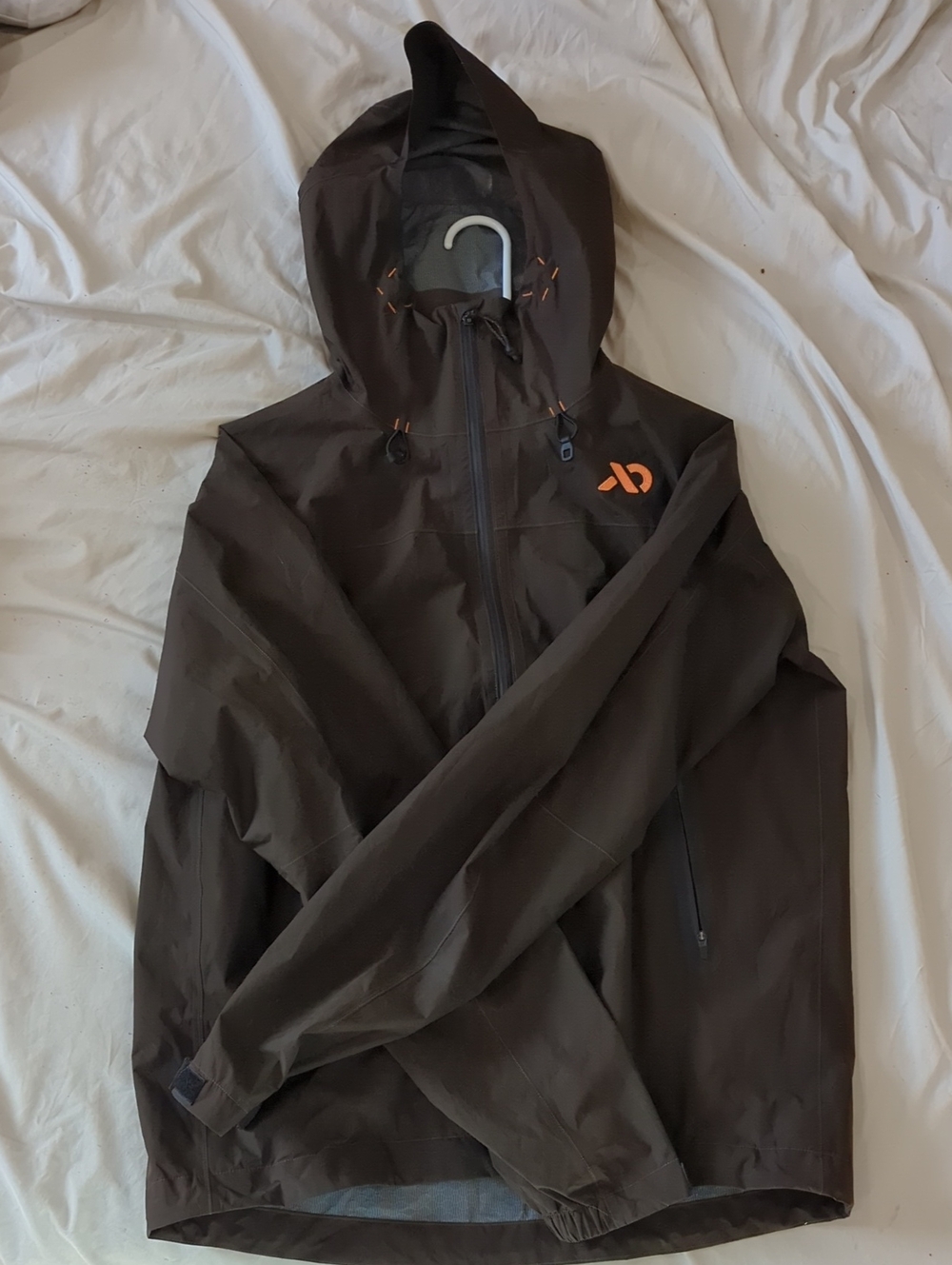 First Lite Men's Hooded Rain Shell in Dark Brown with Orange Logo